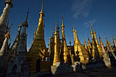 Inle Lake Myanmar. Indein, on the summit of a hill the  Shwe Inn Thein Paya a cluster of hundreds of ancient stupas. Many of them are ruined and overgrown with bushes. 